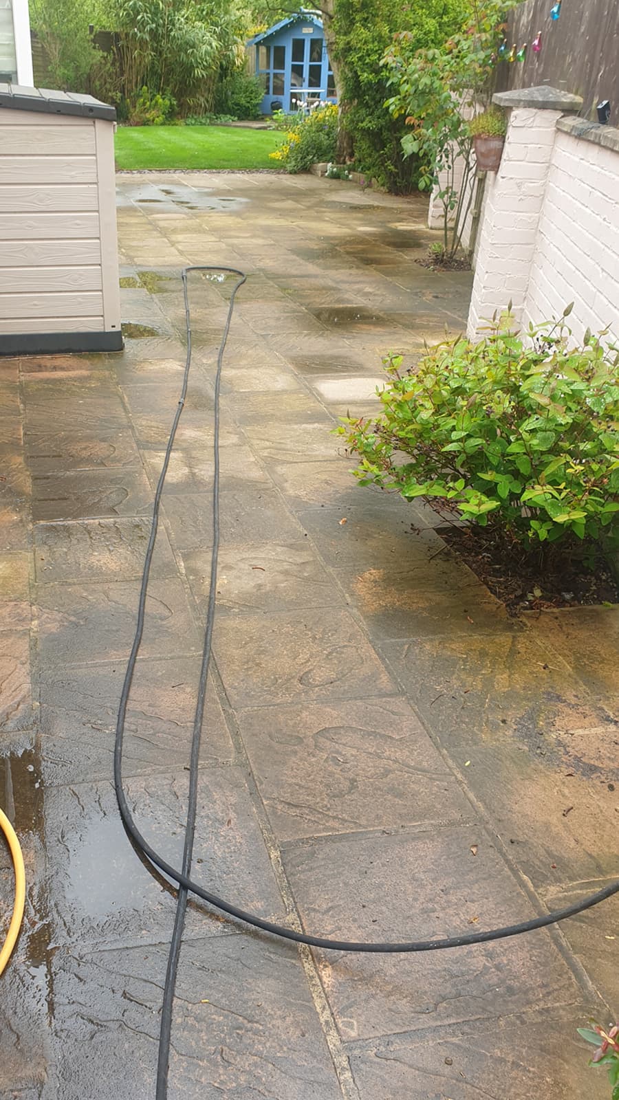 Patio power wash transformation - before
